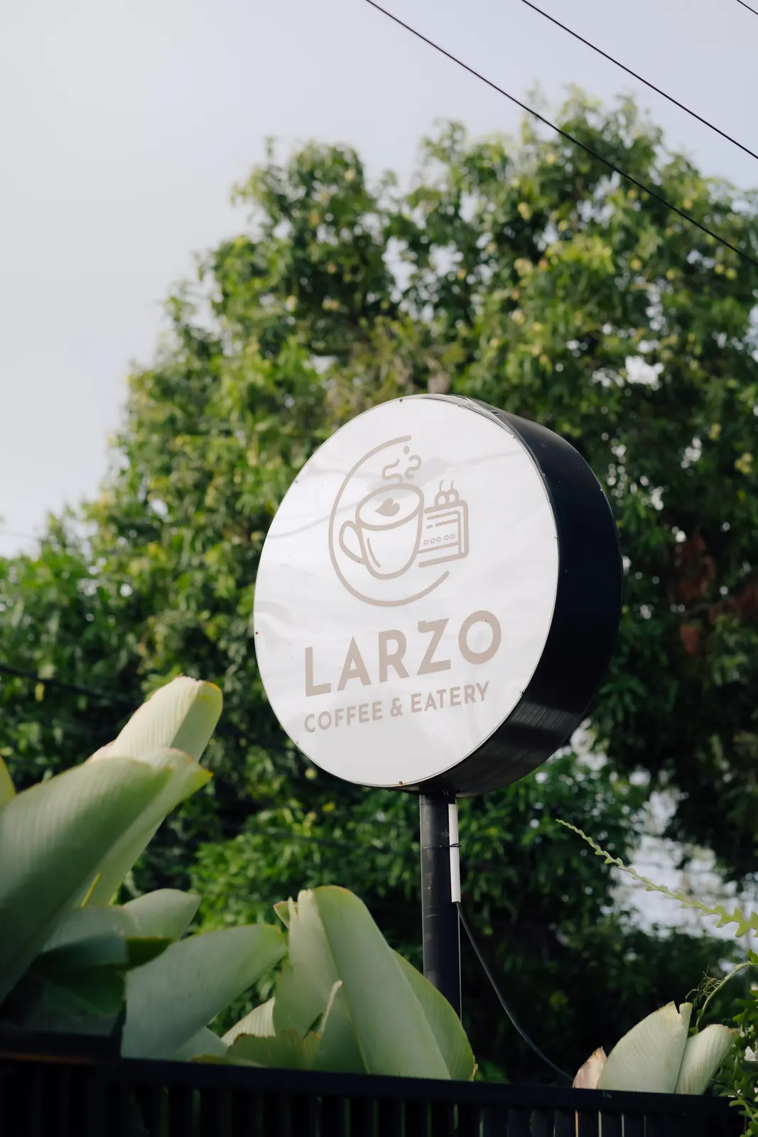 LARZO sign outside the café